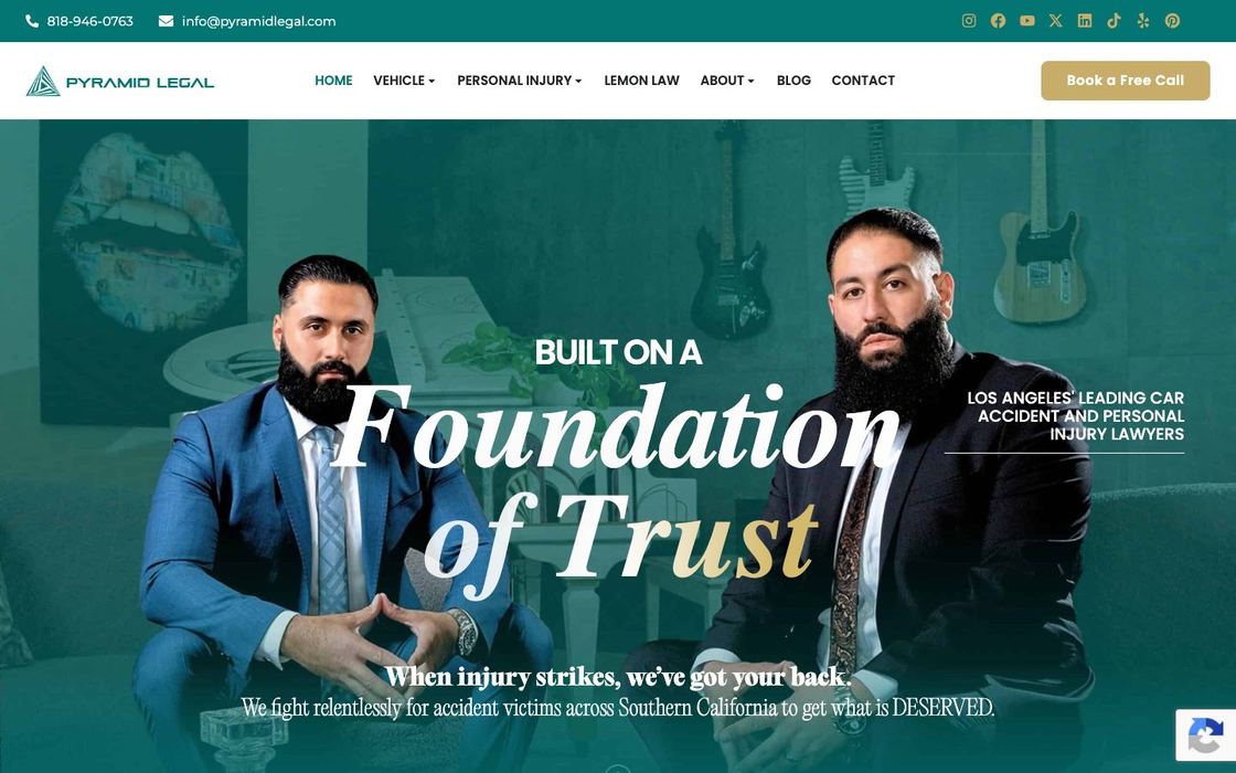 Pyramid Legal website: cinematic dark green homepage with two attorneys and the words Built on a foundation of trust