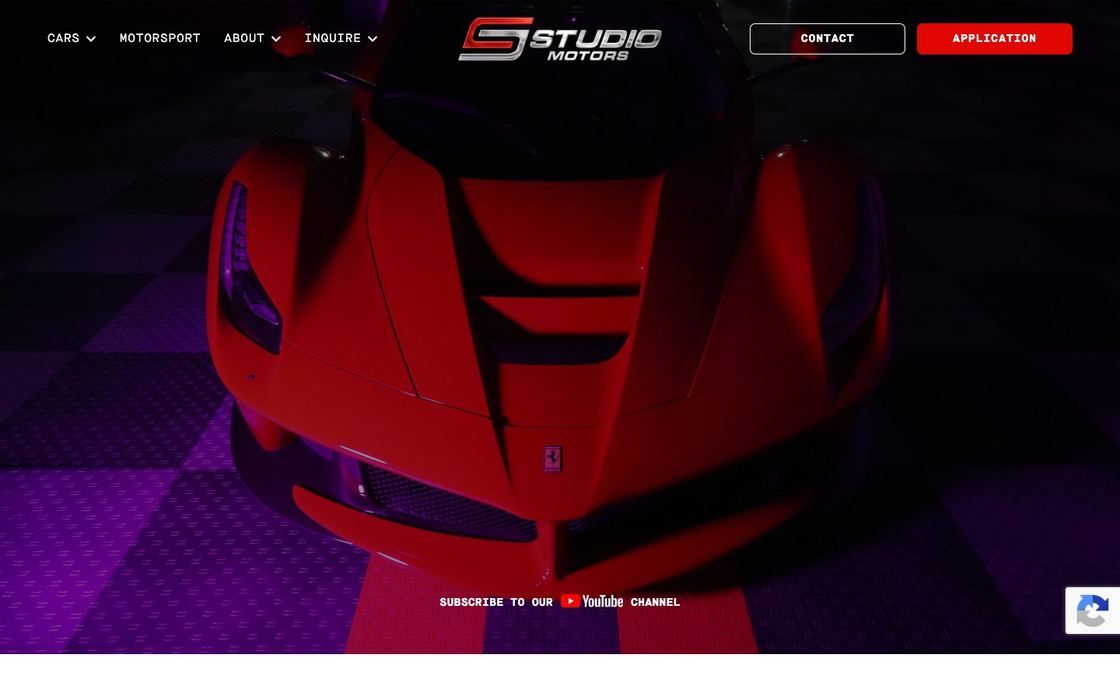 Studio Motors website: dark homepage with a red supercar under neon light